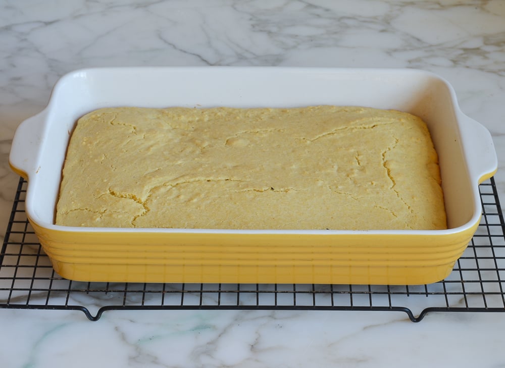 baked cornbread cooling on rack