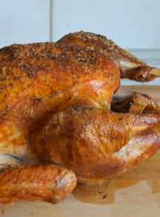 Roasted turkey on a cutting board.