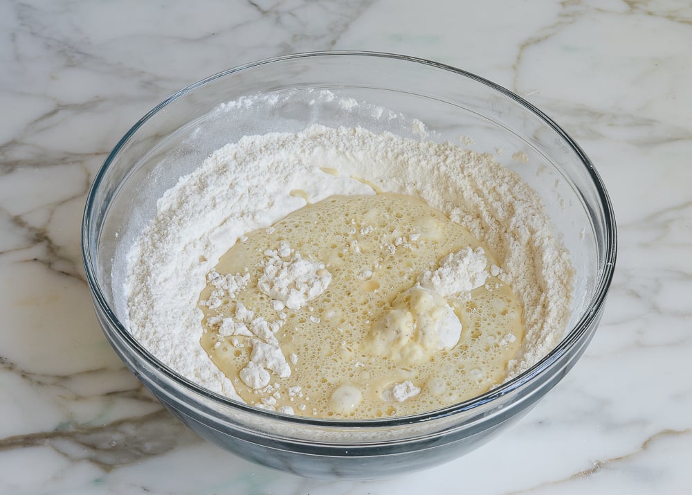 Unmixed wet and dry ingredients in a bowl.