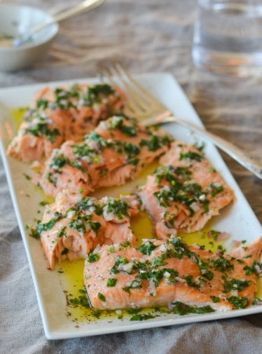 Platter of slow-roasted salmon with French herb salsa.