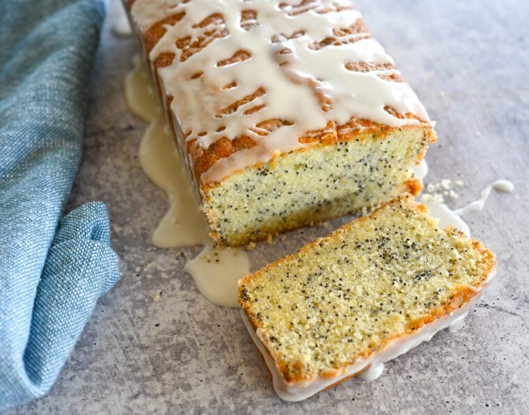 lemon poppy seed loaf with one slice cut off