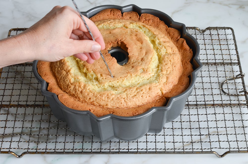 poking holes in bottom of Kentucky butter cake