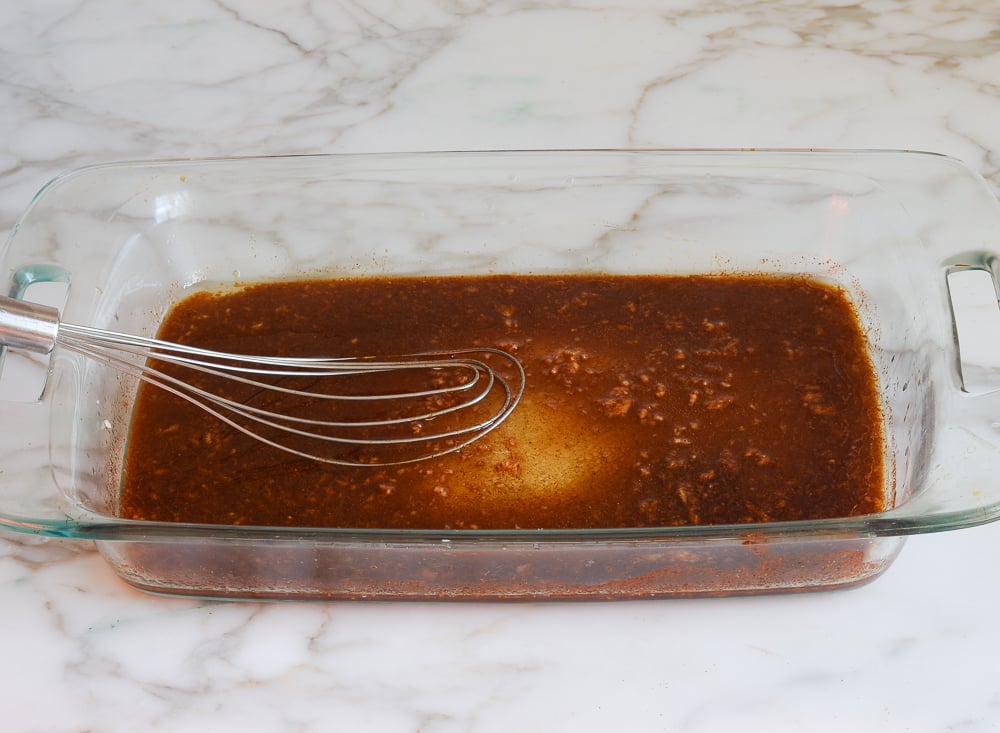 whisking marinade ingredients