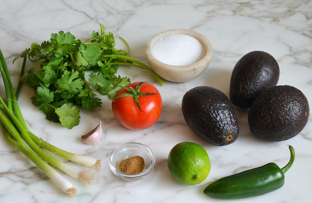 Ingredients for guacamole on the table before making the dip.