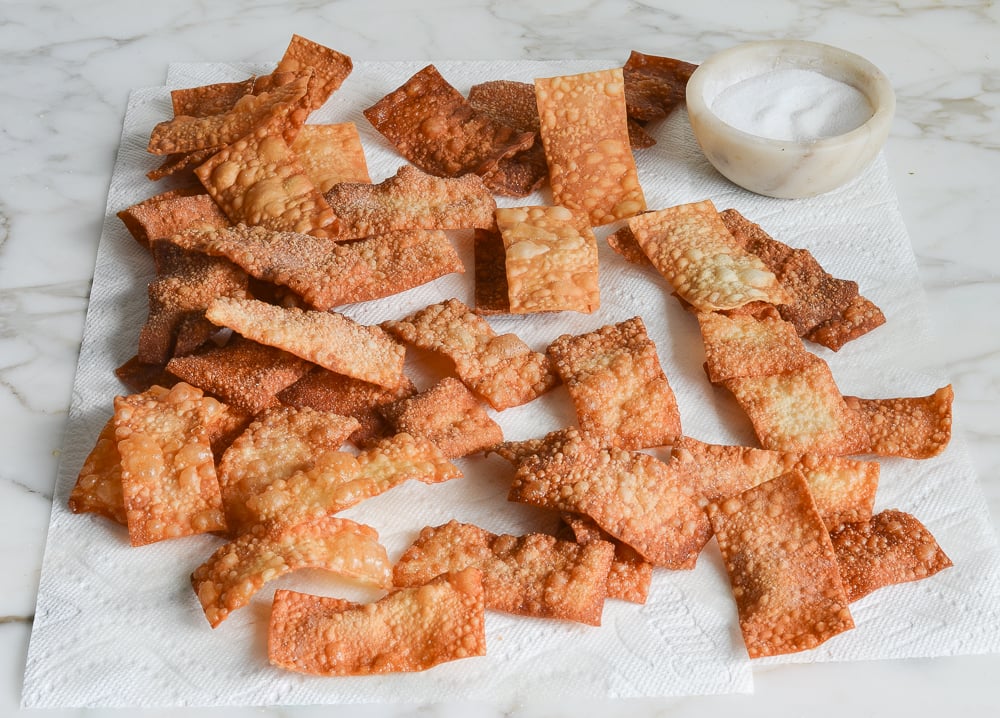 draining wonton crisps on paper towels