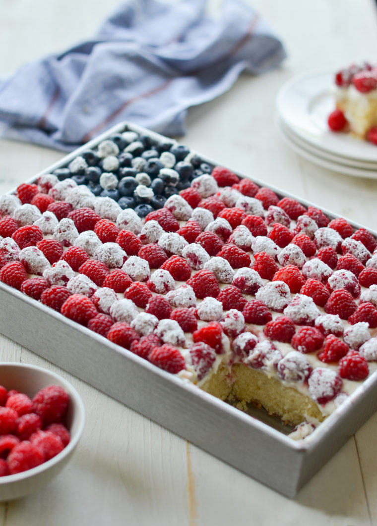 Cake decorated like an American flag missing a piece.