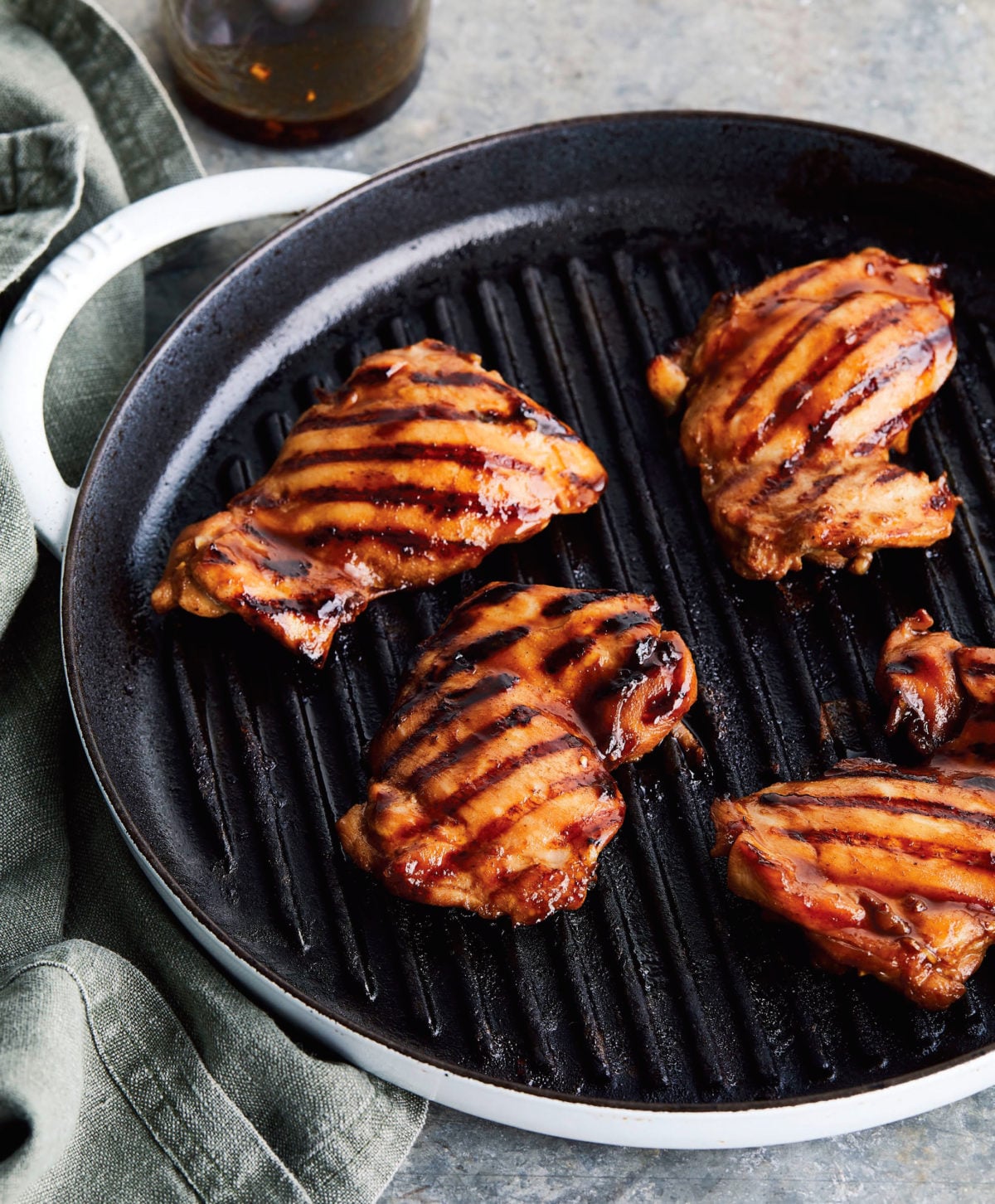 Char siu chicken on a grill pan.
