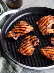 Char siu chicken on a grill pan.