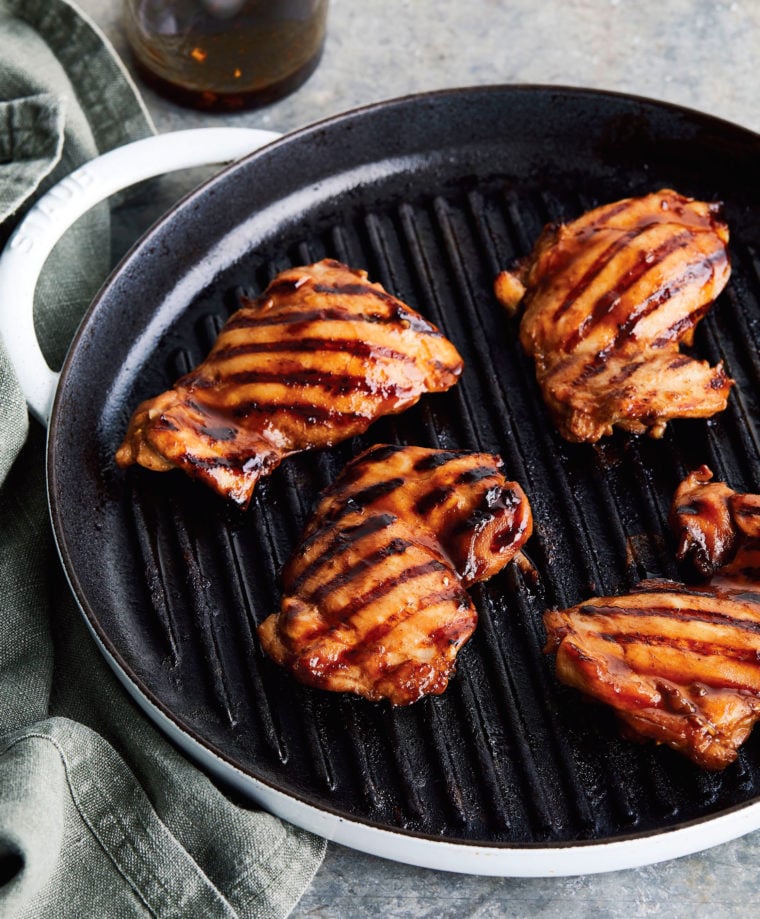 Char siu chicken on a grill pan.