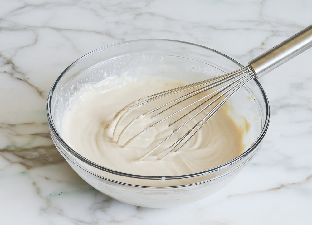 creamy tahini sauce in mixing bowl