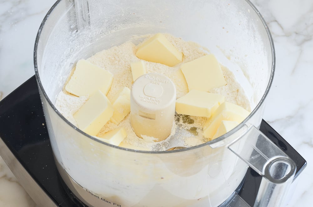 adding butter to flour mixture