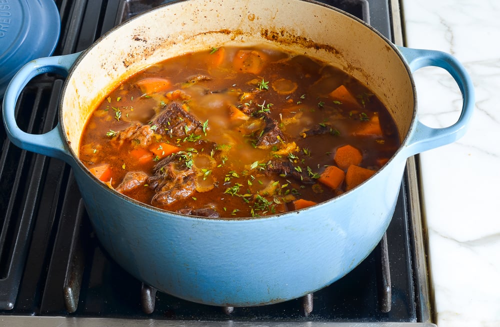 finished beef tzimmes with thyme leaves