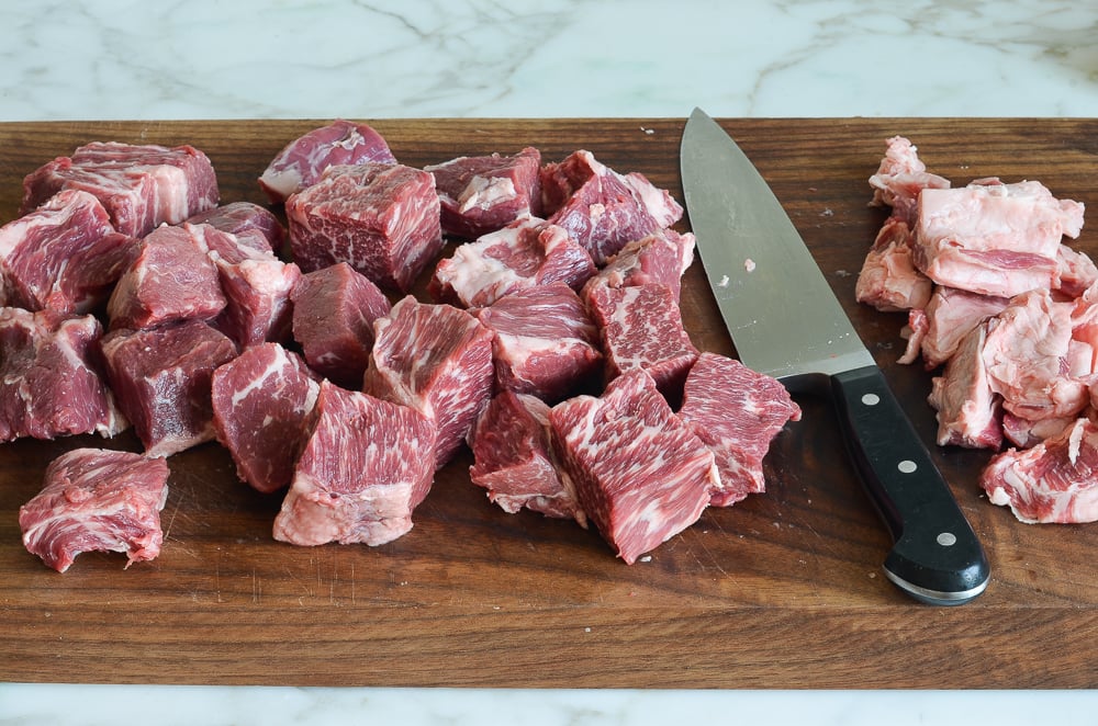 trimming fat from beef chuck