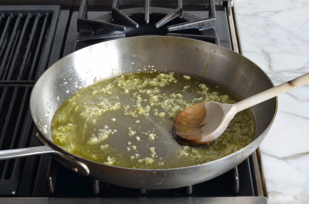 sauteing the garlic in pan