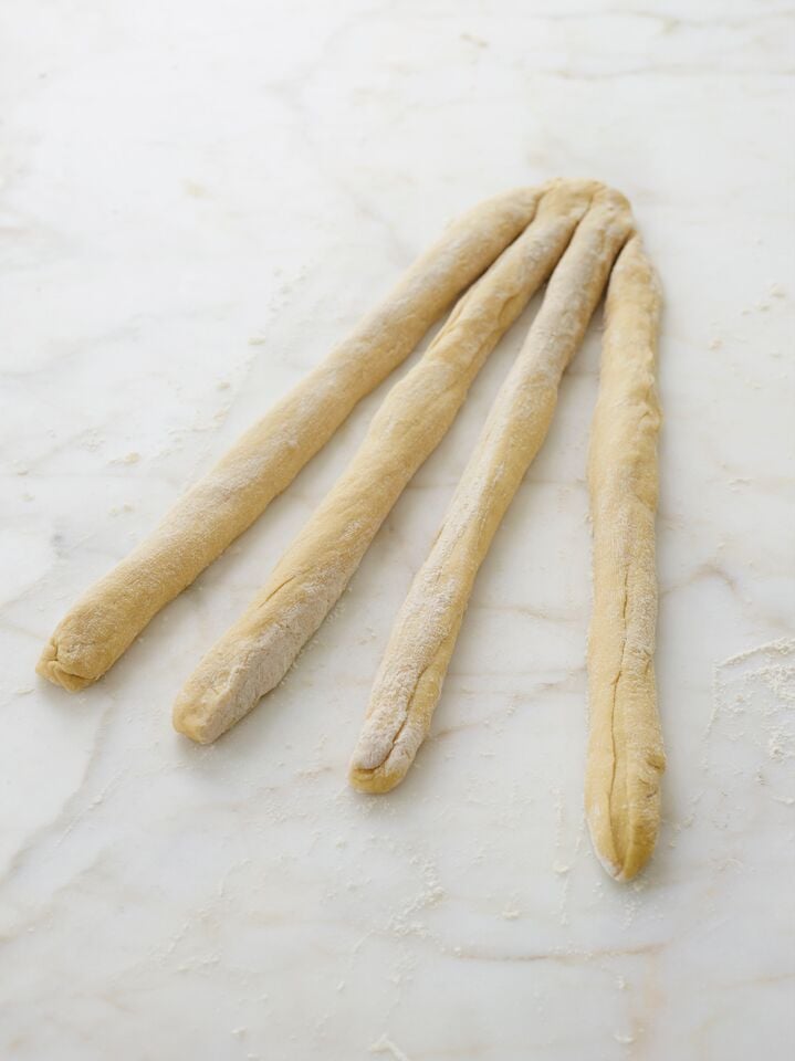 four strands of challah dough