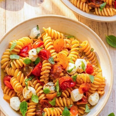 bowls of fusilli caprese on table