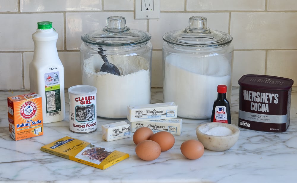 Ingredients to make a chocolate marble cake on the counter.