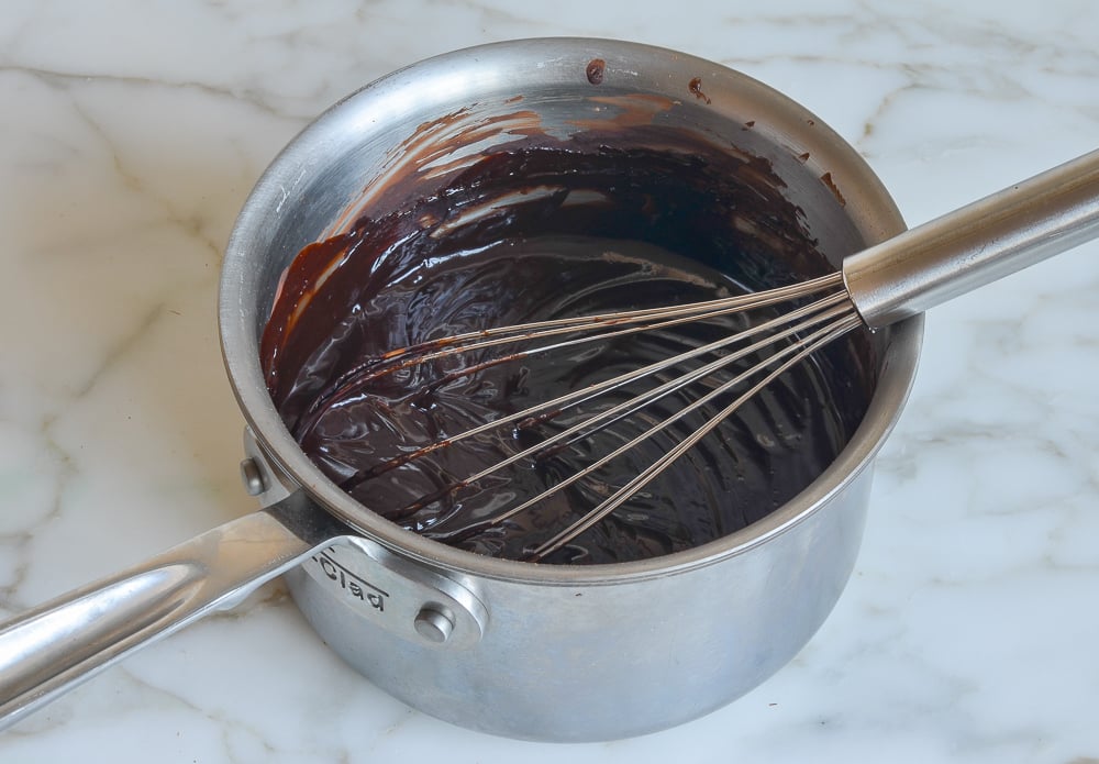 Whisk in a sauce pan of chocolate mixture.