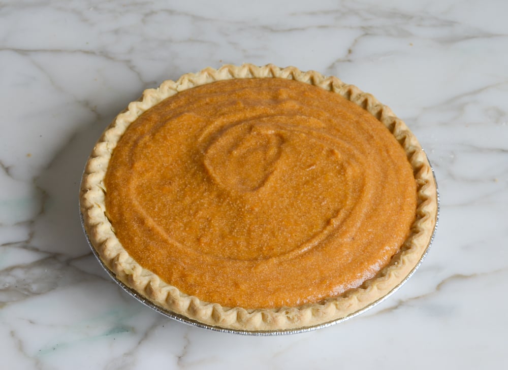 filled sweet potato pie ready to bake 