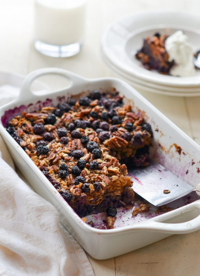 Partially-served dish of blueberry baked oatmeal.