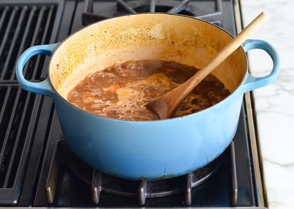 simmering sauce to thicken