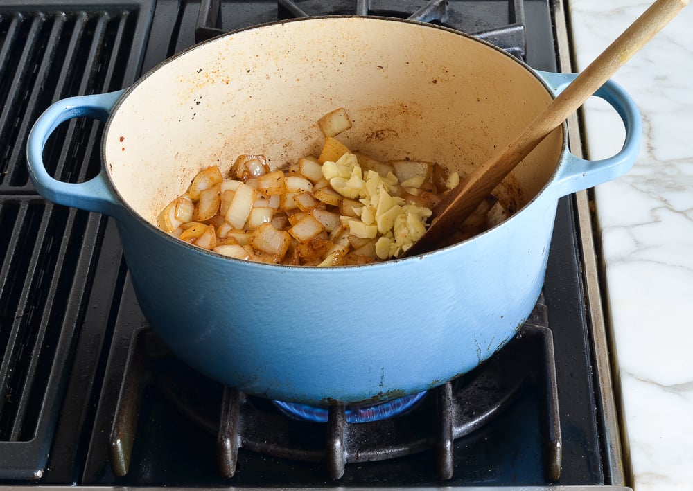 cooking onions and garlic in Dutch oven