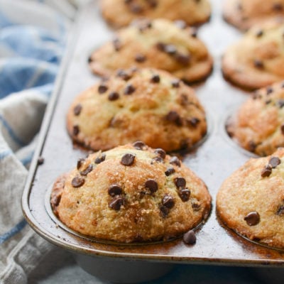 Muffin pan full of chocolate chip muffins.