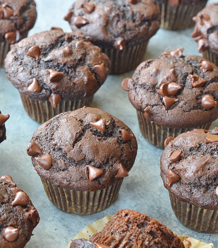 Chocolate muffins on a countertop.