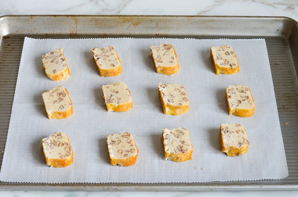 sliced shortbread cookies on baking sheet ready to bake