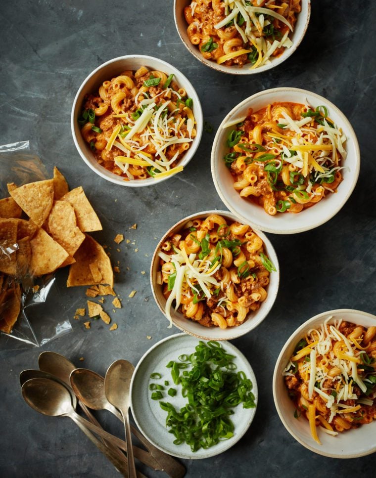 Bowls of chili mac on a table.