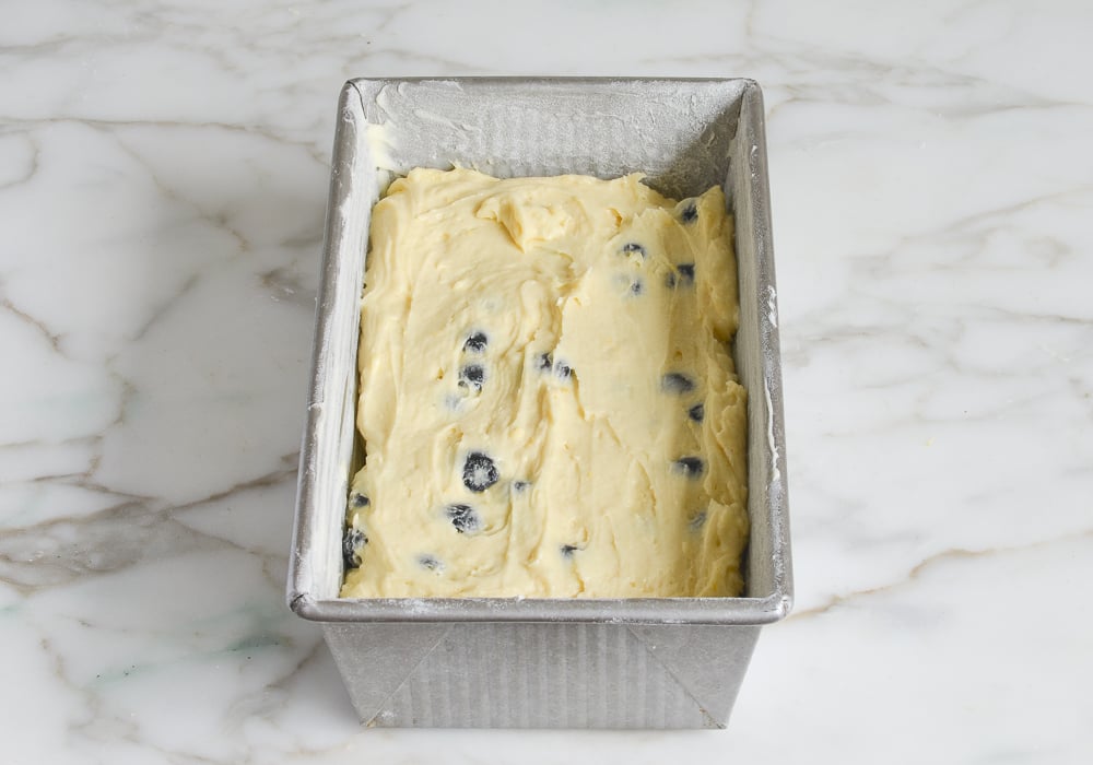 lemon blueberry pound cake batter in loaf pan