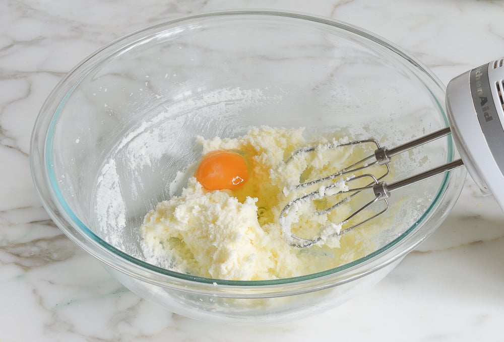 adding the eggs one at a time