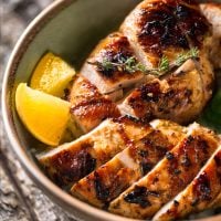 Bowl of sliced, grilled chicken.