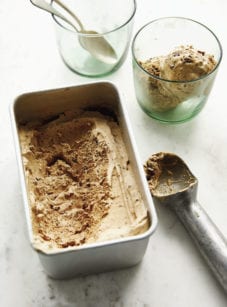 Vietnamese coffee ice cream in a glass and a metal container.