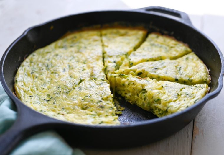 Zucchini frittata in a skillet.