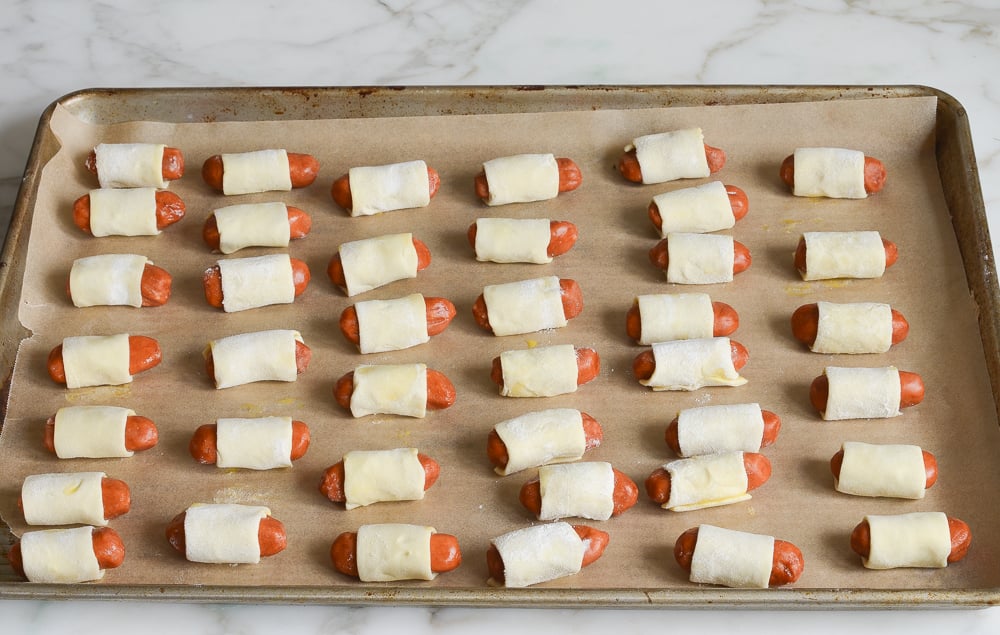 pigs in a blanket on baking sheet