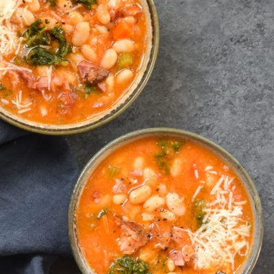 Two bowls of smoky white bean and ham soup.