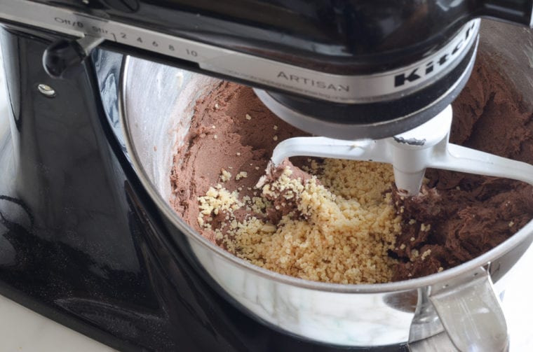 adding almonds to cookies dough