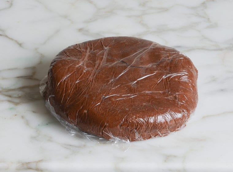 wrapped chocolate cookie dough ready to chill