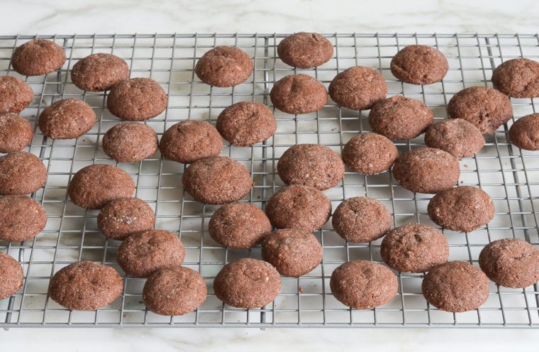 chocolate cookies cooling on baking sheet