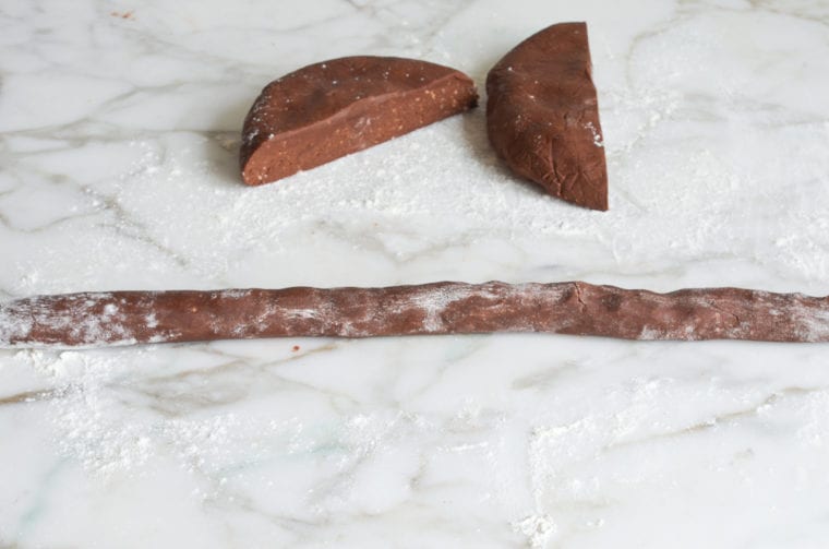 rolling the dough into logs