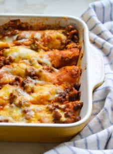 Baking dish of beef enchiladas.