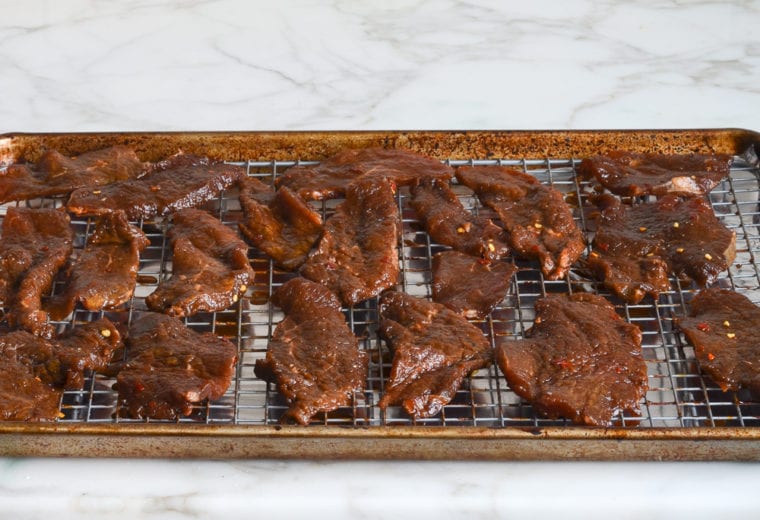 marinated beef on wire rack