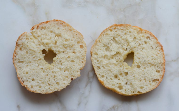 Bagel sliced in half.