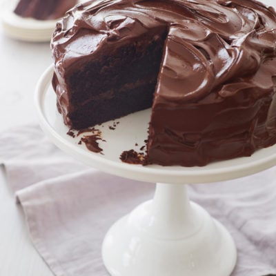 chocolate cake on cake platter.