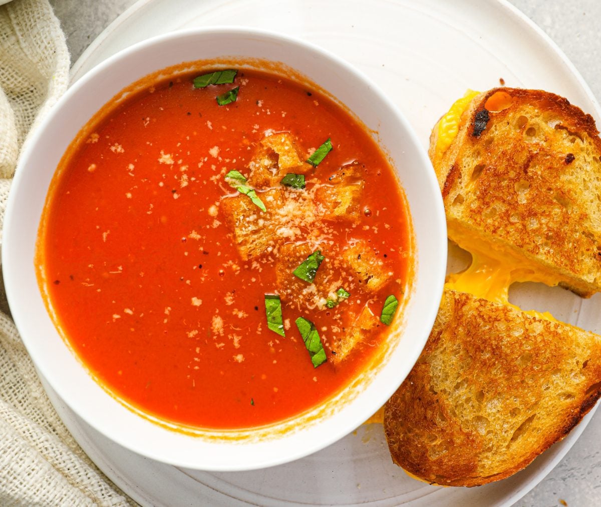 bowl of tomato soup with grilled cheese