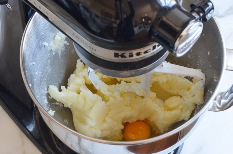 adding the eggs one at a time