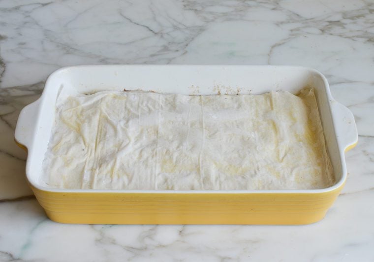 layered baklava before baking