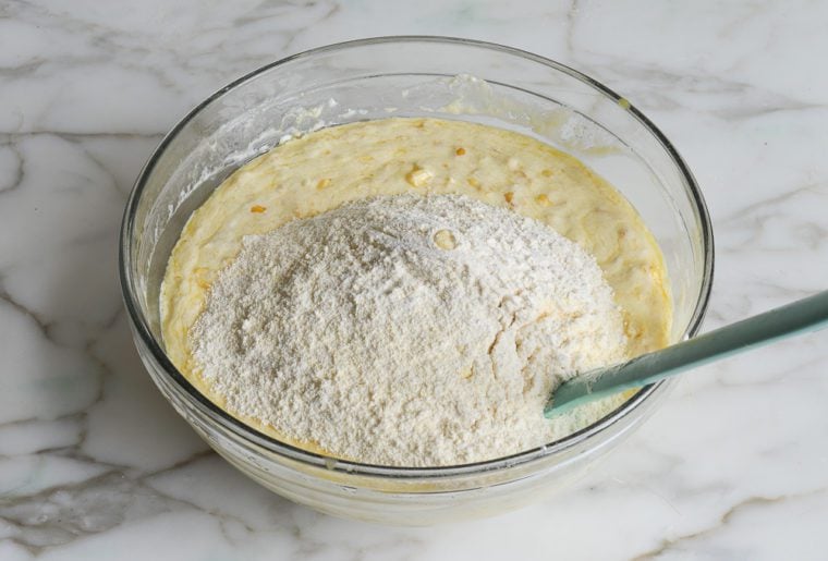 adding the dry ingredients to the wet ingredients