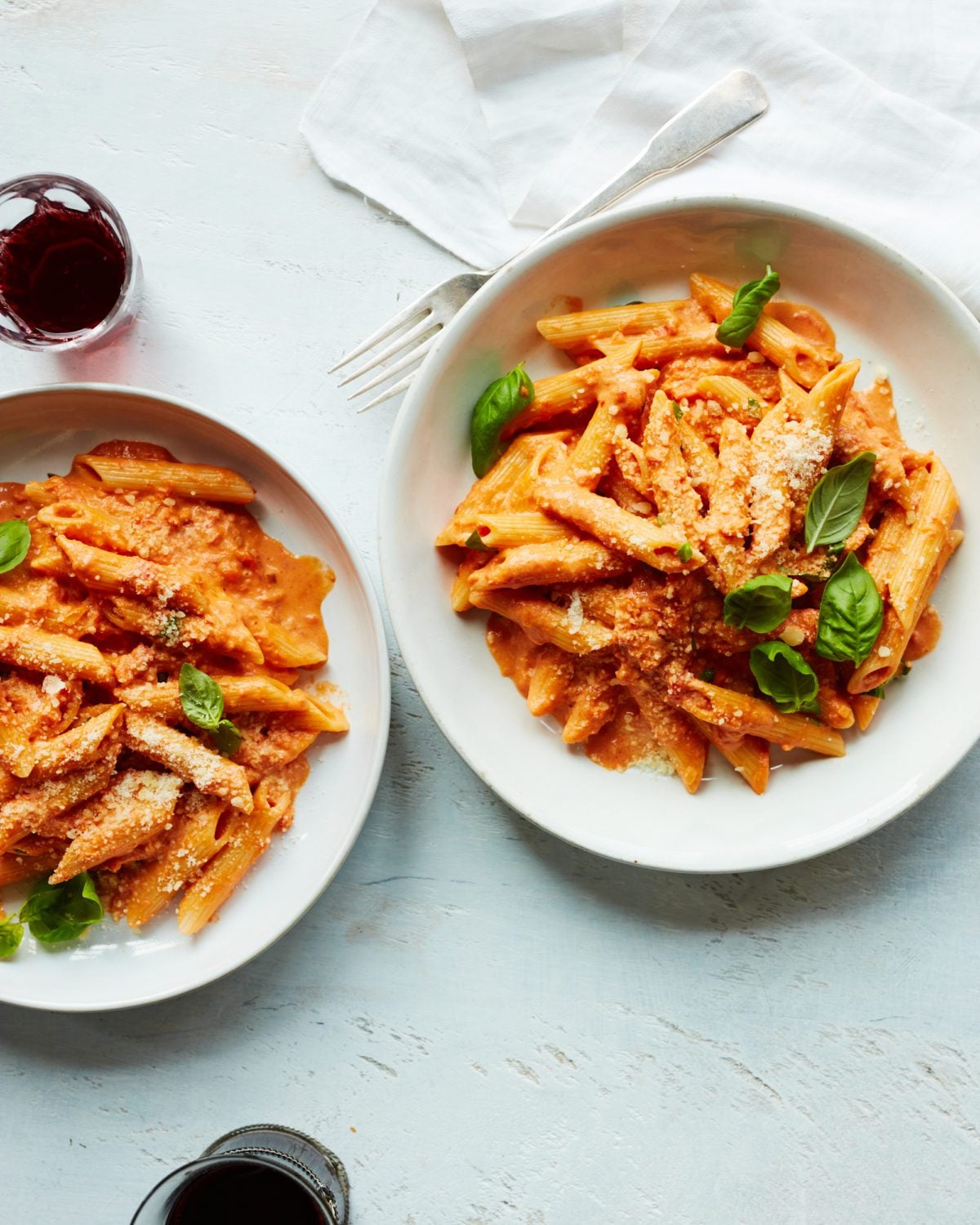 Two plates of penne alla vodka.